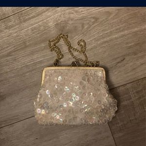 Small white sequined clasp purse